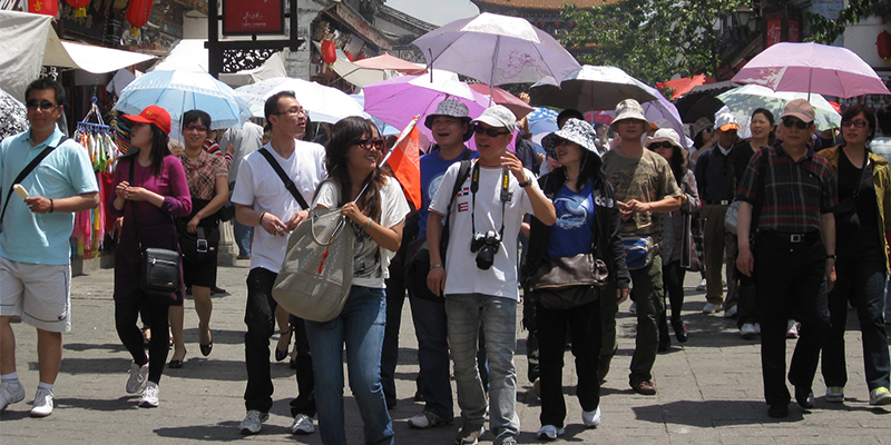 Turistas chinos se preparan para empezar a viajar 